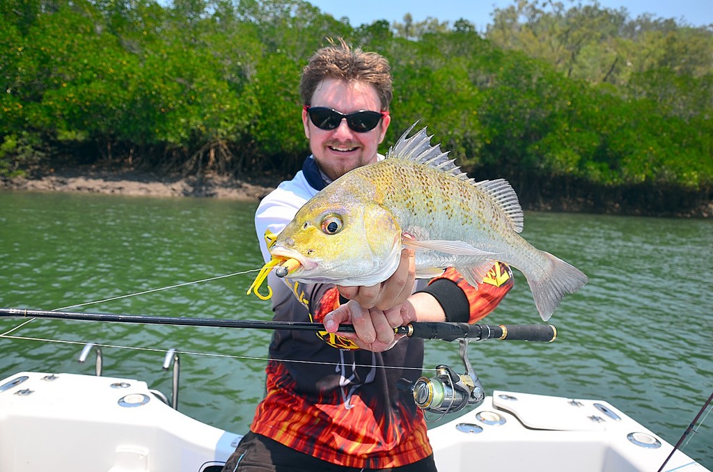 Lee Brake with a javelin fish or grunter which smash a Berkley Gulp Crazy Legs Jerkshad.  This plastic has accounted for more than a few of these fish. © Lee Brake